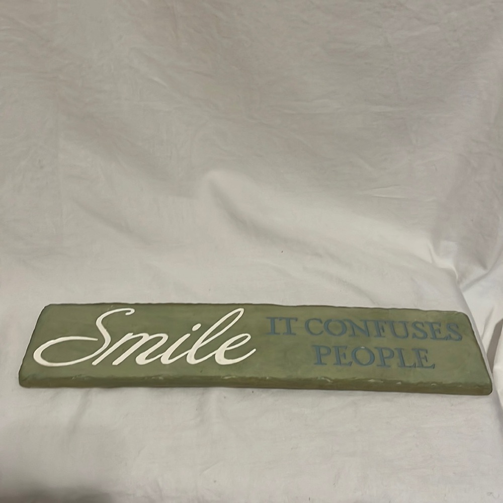 Smile it confuses people sign